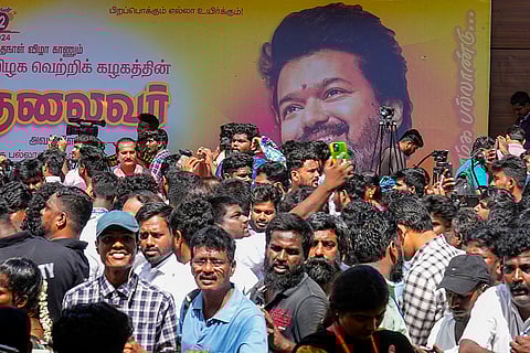 Supporters of actor-turned-politician and Tamilaga Vettri Kazhagam President Vijay during Unveiling of party flag